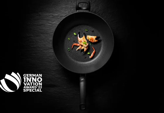 Ⓜ️🔵🔵🔵 Fissler Wok - Wok, Serie Adamant, Nero (superficie esterna/interna) Capacità 6 Litri, Diametro 32 cm, Impugnatura ergonomica, Antiaderente, Fondo Fissler CookStar