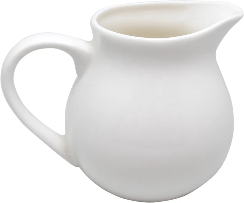 Jarra de leche de porcelana blanca