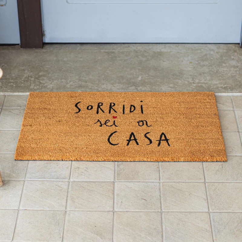 Zerbino "Sorridi sei a casa"