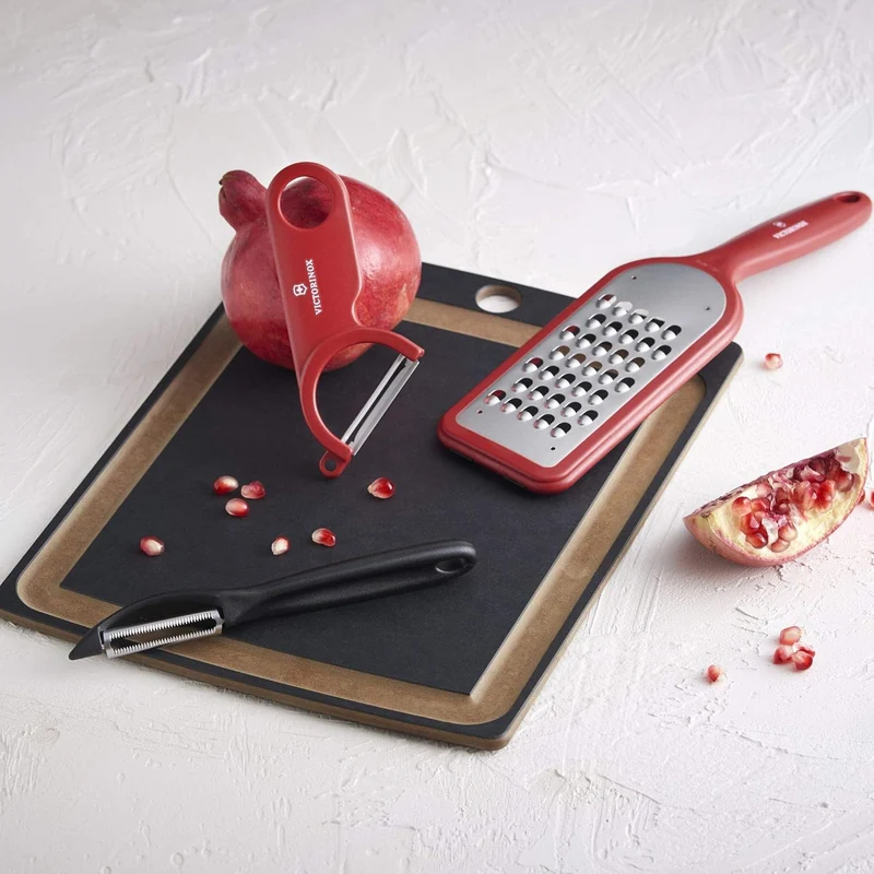Sbucciatore UNIVERSALE seghettato, doppio taglio, impugnatura ergonomica / Nero
