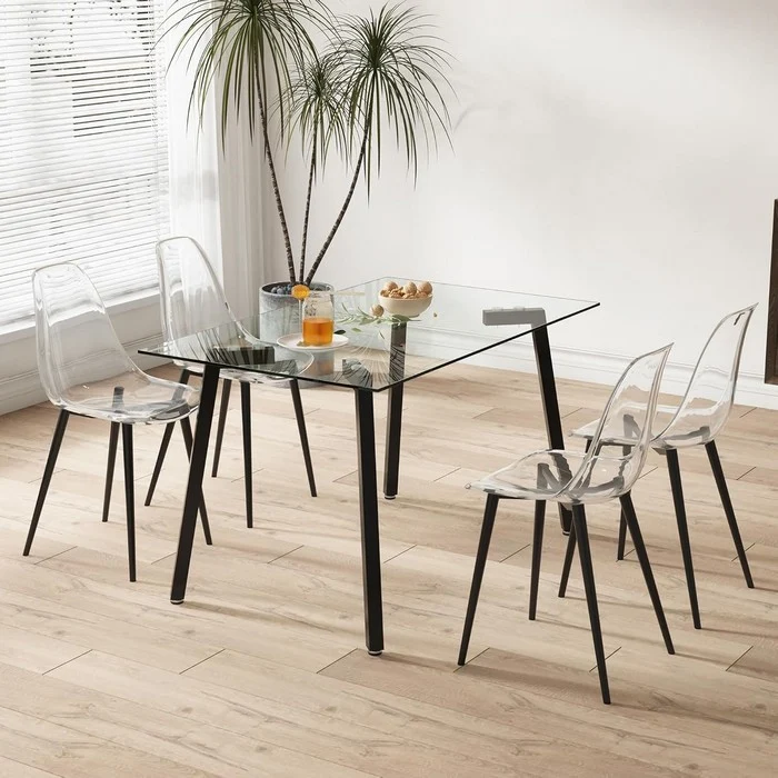Sedia moderna in policarbonato con gambe in metallo nero - Beatrice