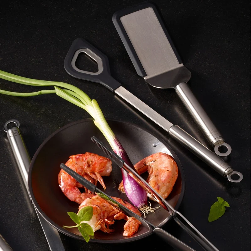 Cuchara espátula con agujero de inox con bordes de silicona Rösle