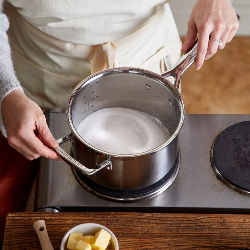 Set de 3 cazos con tapa de acero inoxidable 3-PLY Le Creuset